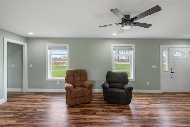 sitting room featuring recessed lighting, wood finished floors, and a wealth of natural light