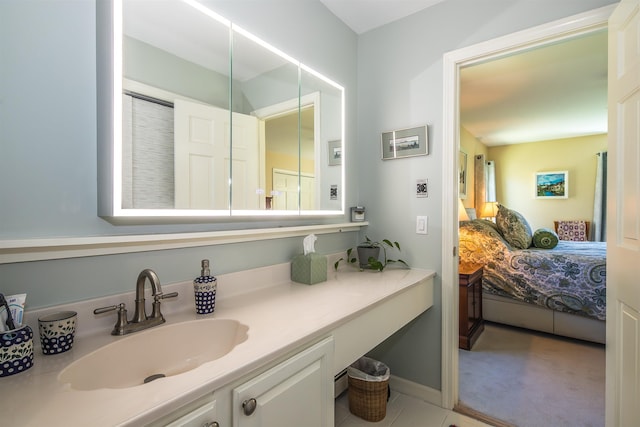 ensuite bathroom featuring vanity and ensuite bath