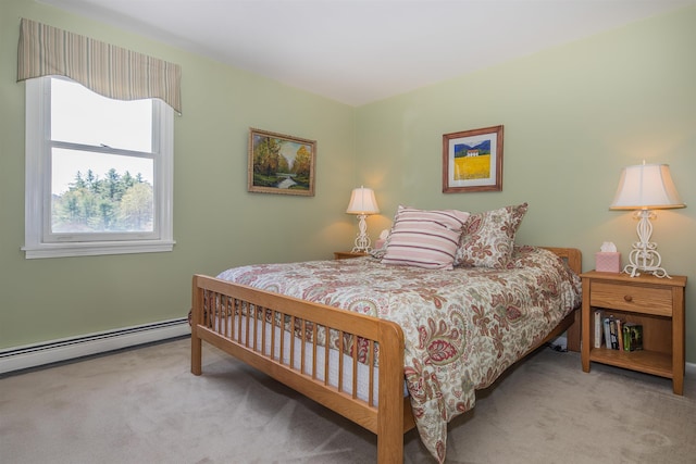 bedroom featuring carpet and baseboard heating