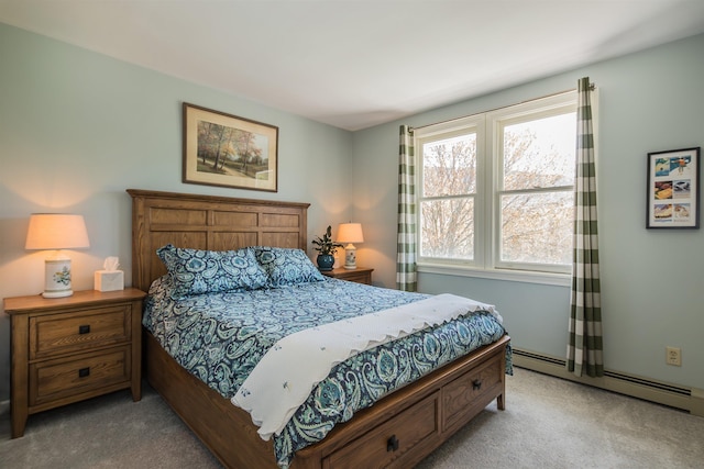 bedroom with light colored carpet and a baseboard heating unit