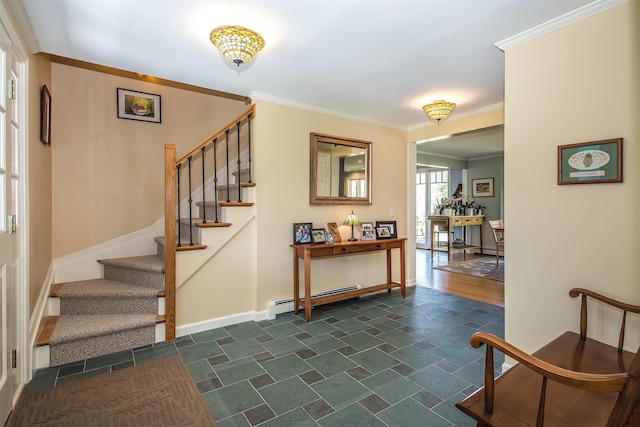 entrance foyer featuring stone finish flooring, crown molding, stairway, baseboards, and a baseboard heating unit