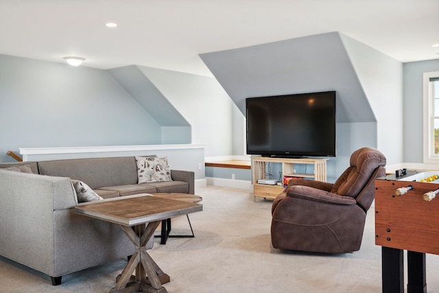living room with recessed lighting, baseboards, and light colored carpet