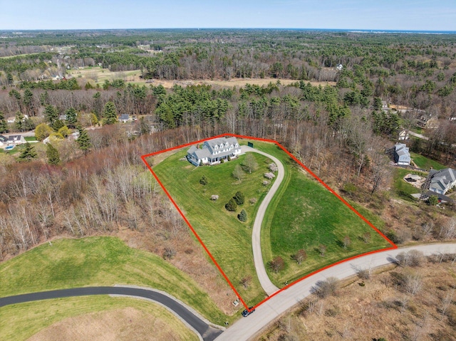 aerial view featuring a forest view