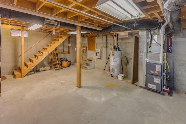 unfinished below grade area with heating unit, water heater, and stairway