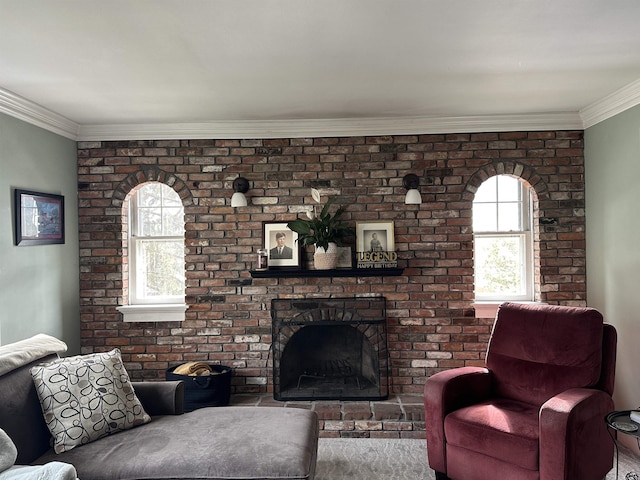 living room featuring a brick fireplace and ornamental molding