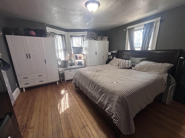 bedroom featuring hardwood / wood-style floors