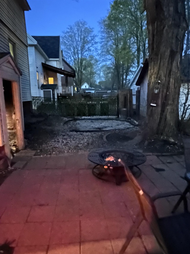 view of patio / terrace with a fire pit
