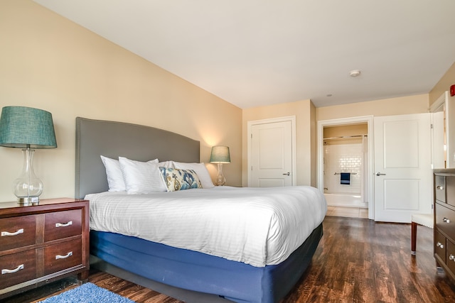 bedroom with wood finished floors
