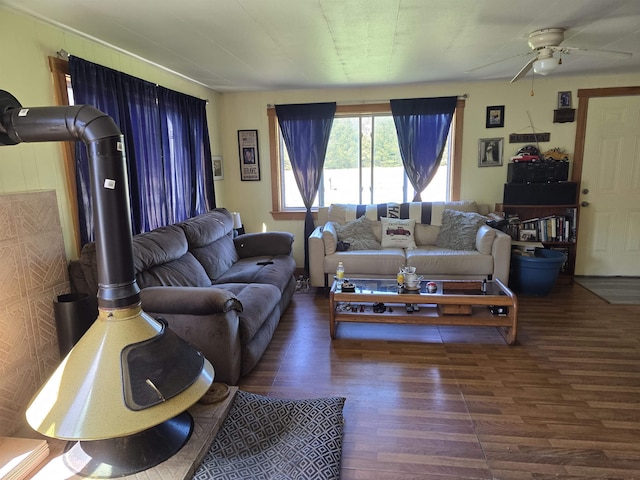 living area with ceiling fan and wood finished floors