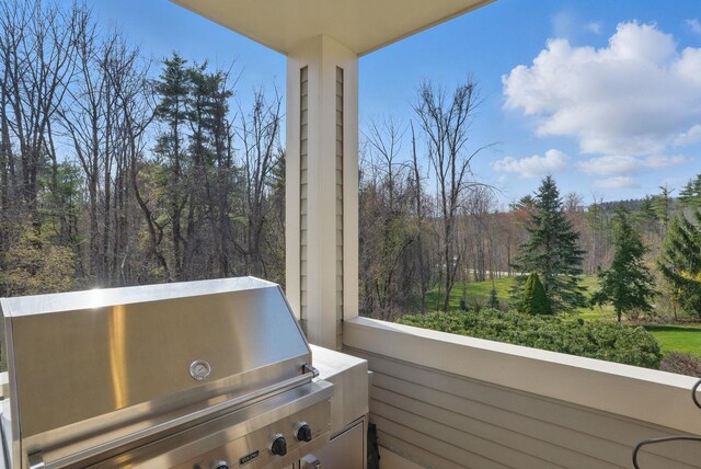 7 Champagne Ter, Bedford, NH 03110 - balcony with a view of trees and grilling area