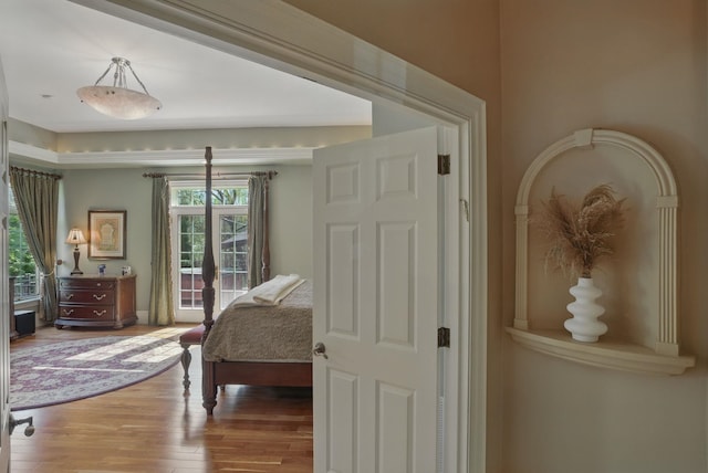 7 Champagne Ter, Bedford, NH 03110 - bedroom featuring access to outside and wood finished floors