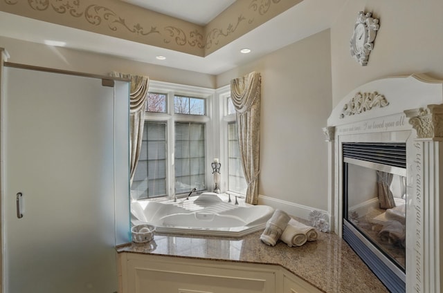 7 Champagne Ter, Bedford, NH 03110 - bathroom with recessed lighting and a glass covered fireplace