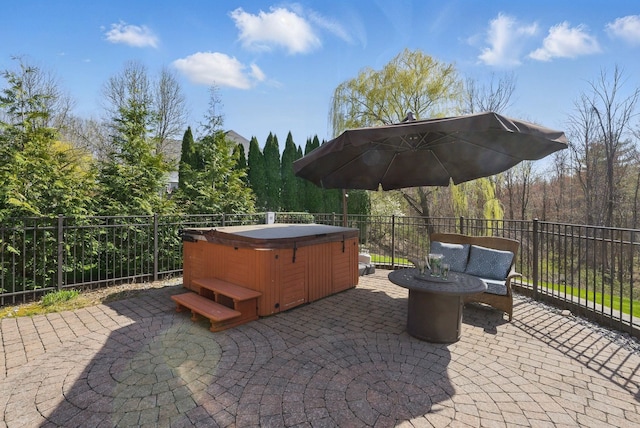 7 Champagne Ter, Bedford, NH 03110 - view of patio / terrace with a hot tub and fence