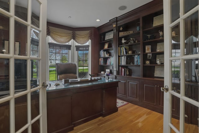 7 Champagne Ter, Bedford, NH 03110 - home office featuring french doors and light wood-type flooring