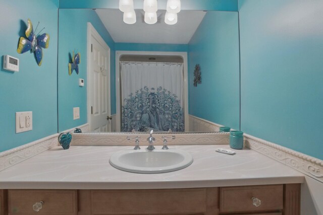 7 Champagne Ter, Bedford, NH 03110 - bathroom featuring vanity and a shower with curtain