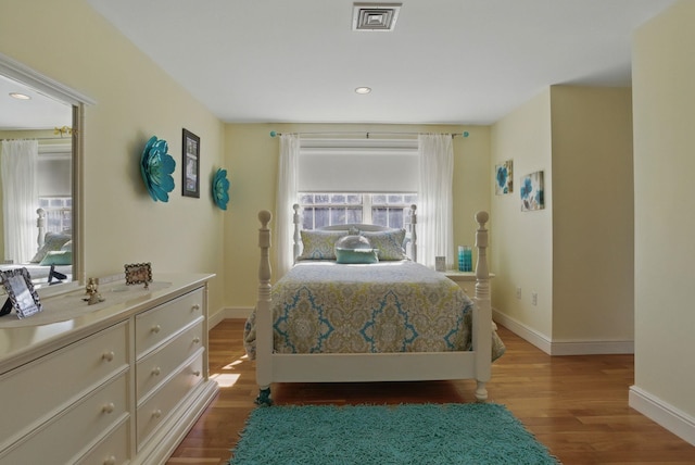 7 Champagne Ter, Bedford, NH 03110 - bedroom featuring baseboards, recessed lighting, wood finished floors, and multiple windows