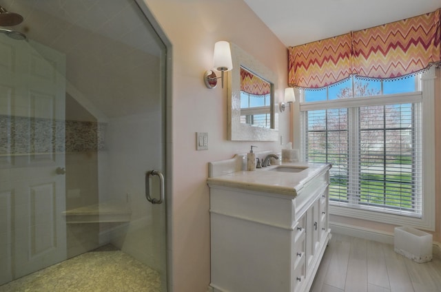 7 Champagne Ter, Bedford, NH 03110 - full bathroom featuring vanity, baseboards, a stall shower, and lofted ceiling