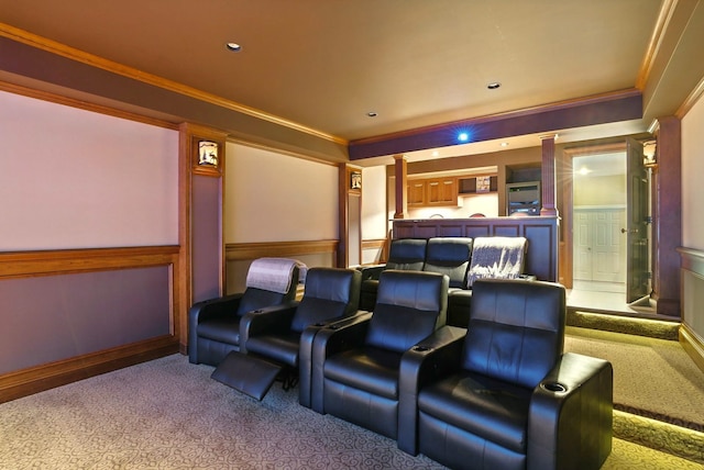 7 Champagne Ter, Bedford, NH 03110 - home theater room featuring crown molding, a decorative wall, carpet, and wainscoting