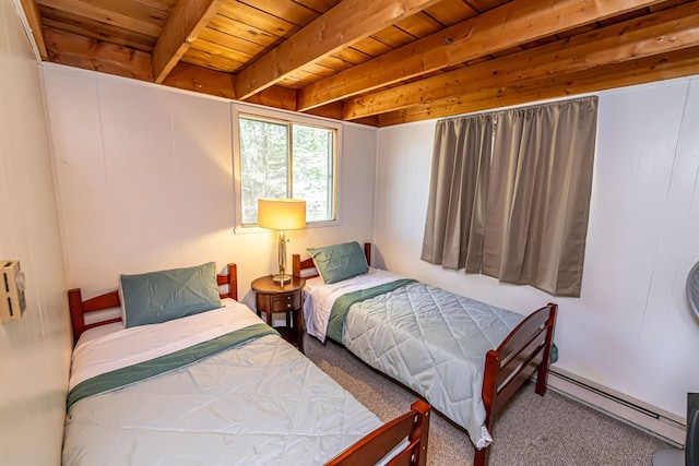 carpeted bedroom with beamed ceiling, wooden ceiling, and a baseboard radiator