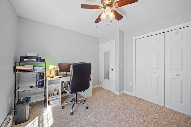 home office featuring baseboards, ceiling fan, carpet, and a baseboard heating unit