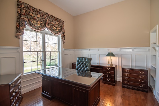 office with wainscoting, a decorative wall, and dark wood finished floors