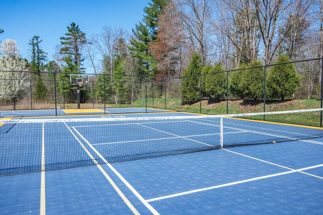 view of sport court with community basketball court and fence