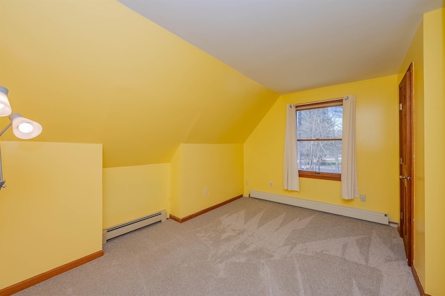 bonus room featuring carpet flooring, a baseboard heating unit, lofted ceiling, and a baseboard radiator