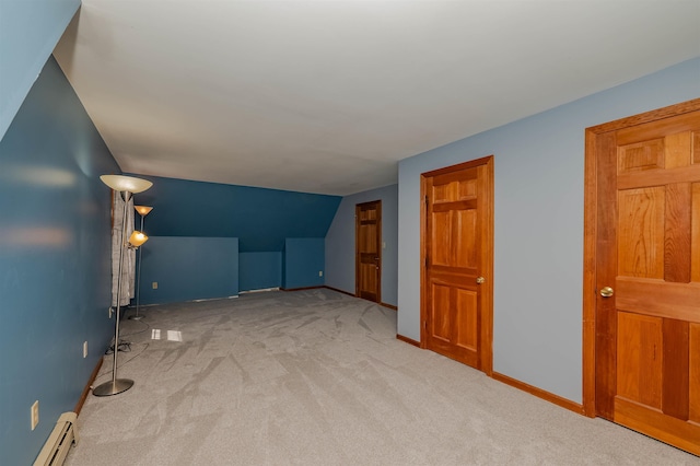 bonus room featuring baseboards, carpet flooring, baseboard heating, and vaulted ceiling