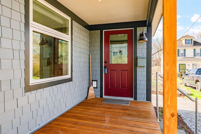doorway to property featuring a porch