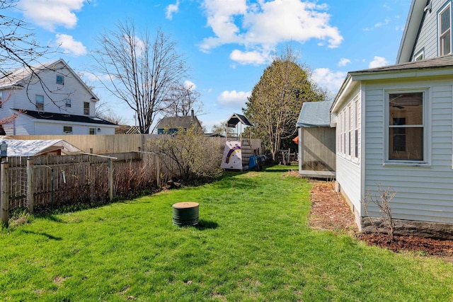view of yard featuring fence