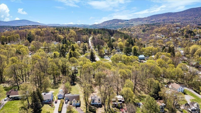 bird's eye view featuring a mountain view and a forest view