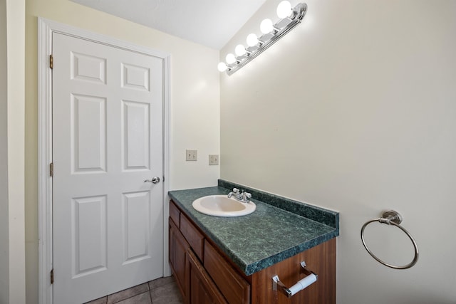 bathroom featuring vanity and tile patterned flooring