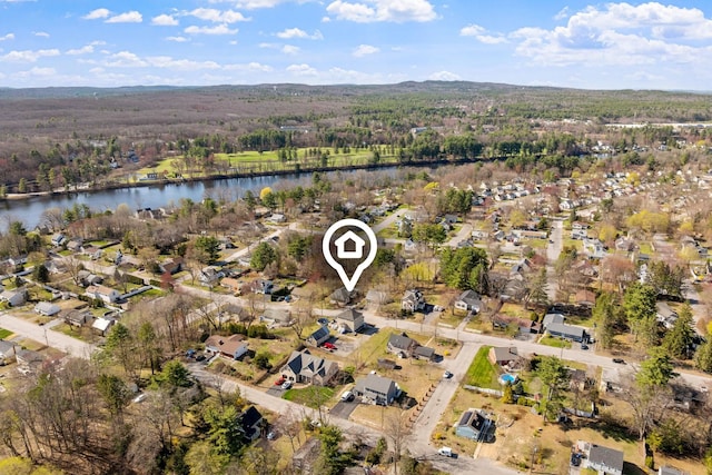 birds eye view of property with a water view and a residential view
