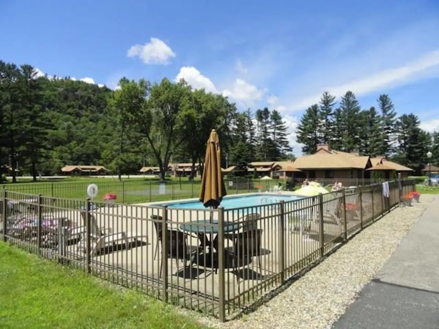 pool featuring fence