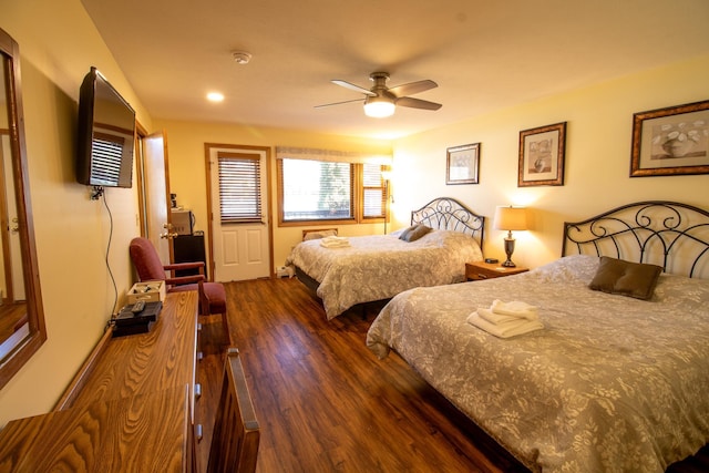 bedroom featuring recessed lighting, a ceiling fan, and dark wood-style flooring