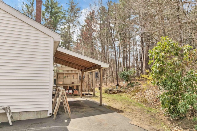 view of patio / terrace featuring a carport