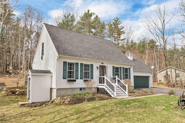 cape cod home featuring a garage, driveway, a front yard, and a shingled roof
