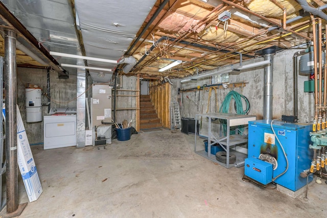 unfinished below grade area with washer / clothes dryer, a heating unit, heating unit, and stairway