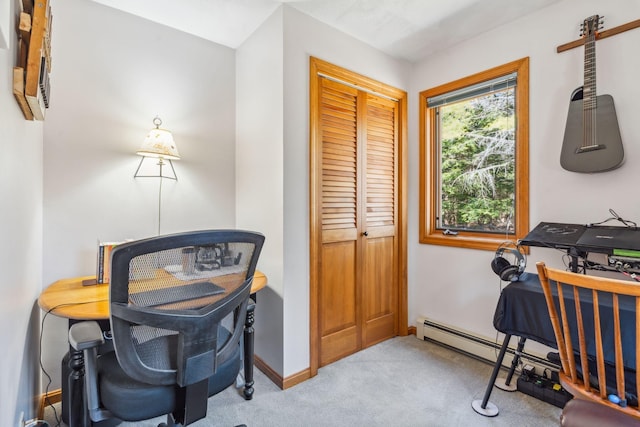 carpeted home office featuring baseboards and baseboard heating
