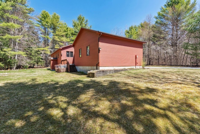 view of property exterior featuring a yard