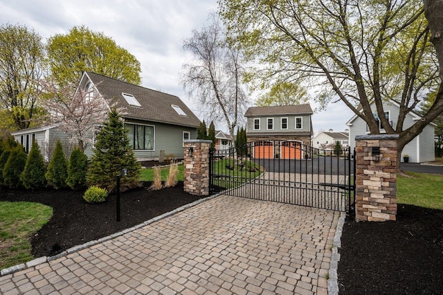 view of gate with fence