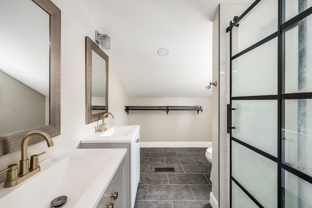 11 Post Rd, North Hampton, NH 03862 - full bathroom with toilet, a shower with door, baseboards, and two vanities