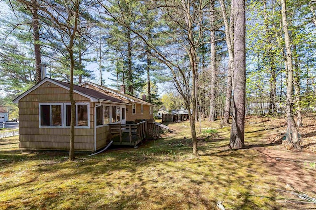 view of yard with a deck