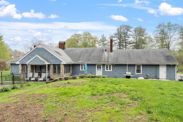 134 Emerson Ave, Hampstead, NH 03841 - rear view of house featuring a chimney