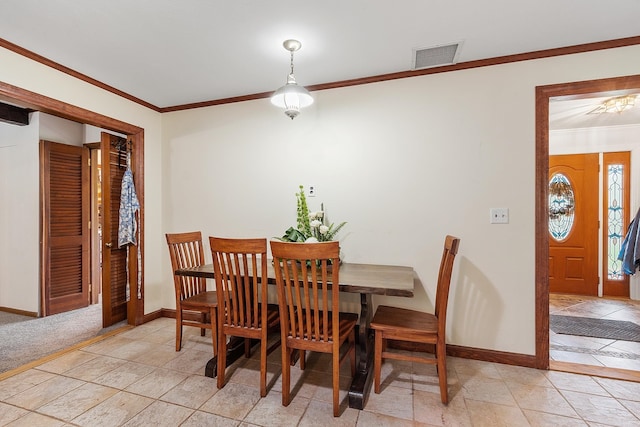 134 Emerson Ave, Hampstead, NH 03841 - dining space featuring crown molding and baseboards
