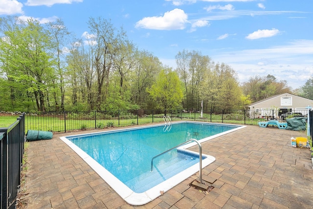 134 Emerson Ave, Hampstead, NH 03841 - view of swimming pool featuring a patio area and fence
