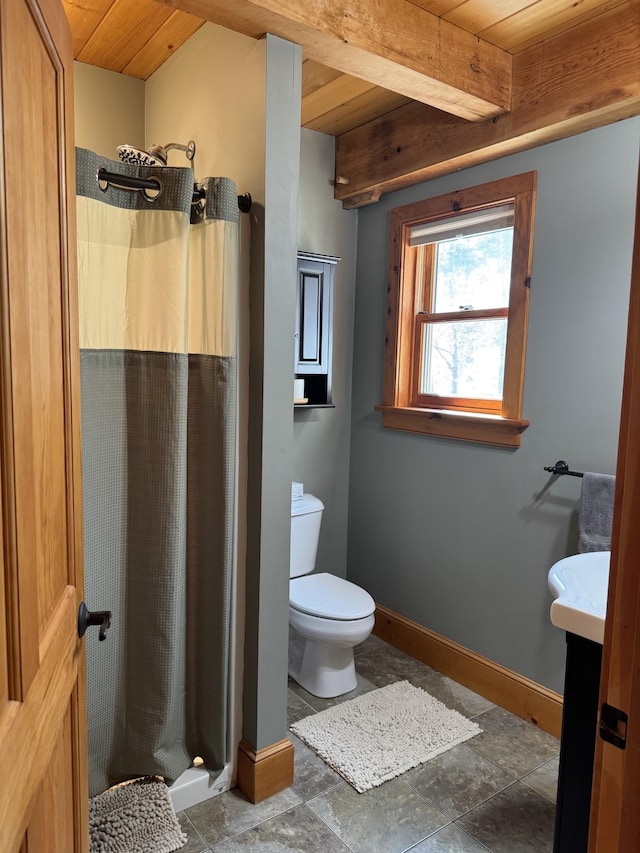 full bathroom featuring toilet, baseboards, a shower stall, and wood ceiling
