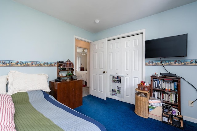 carpeted bedroom with a closet