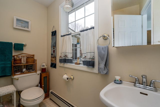 half bath with a sink and toilet