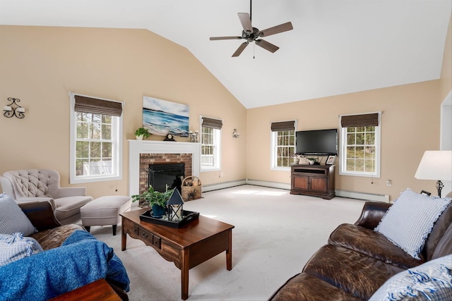 living area with a ceiling fan, a baseboard heating unit, carpet flooring, and a fireplace